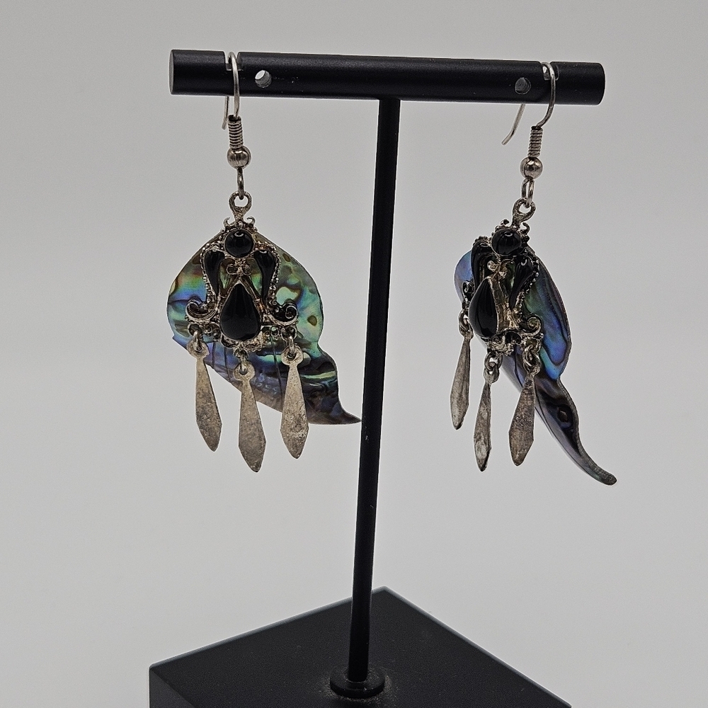 curved abalone dangle earrings with black cabochons and silver tone charms
